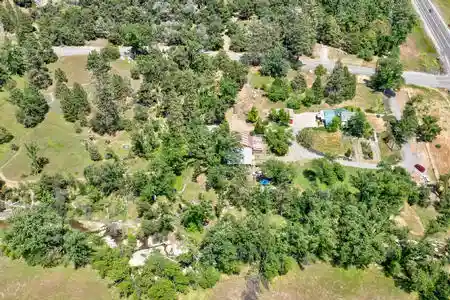 Surrounded by larger parcels and along Highway 49