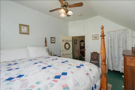 The first of the three upstairs bedrooms