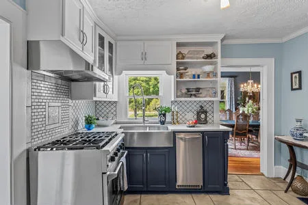 Guest kitchen with gas range, refrigerator, ice maker and microwave