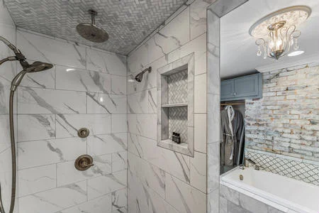 Large tiles shower and soaking tub